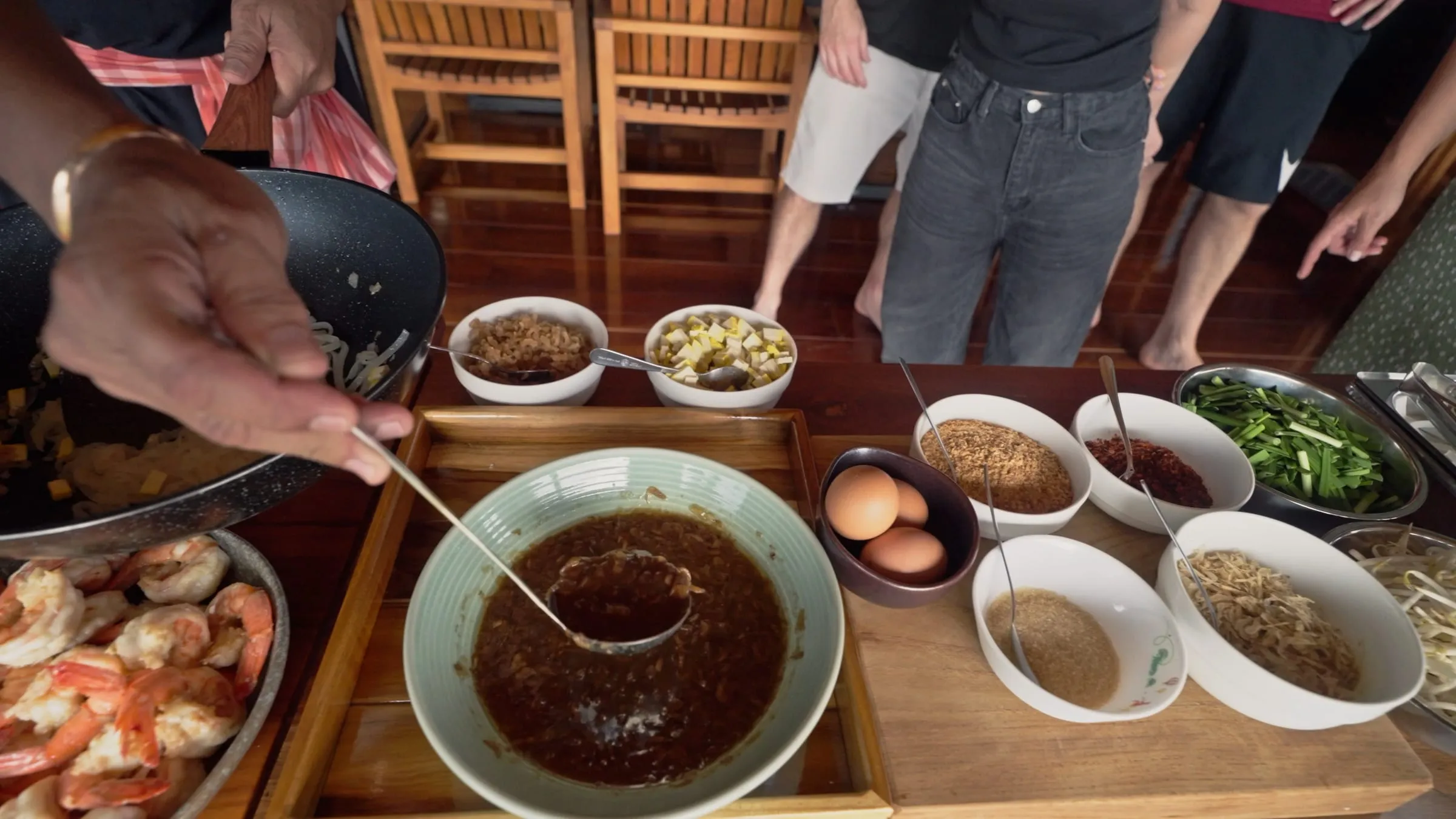 A spread of freshly cooked Thai dishes on the table.